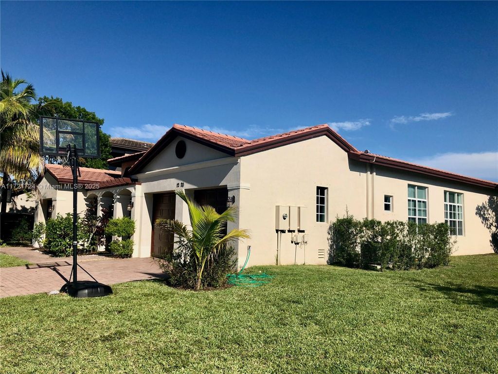 Photo of 12420 NW 81st St, Parkland, FL 33076 (MLS # A11721724)