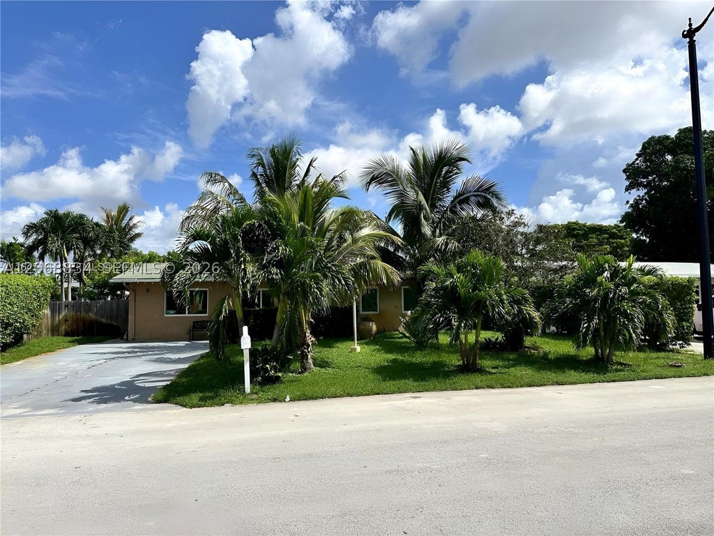 Photo of 1101 NE 23rd Pl, Pompano Beach, FL 33064 (MLS # A12068834)