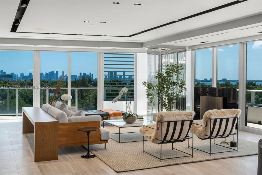 Welcome to an exceptionally rare 4bd, 4.5ba corner unit spanning 4,204 sq ft of refined indoor living. With a private elevator entrance, multiple entertaining areas, and a large media room, this residence feels like a private home. Breathtaking views of the Miami skyline through floor-to-ceiling windows, the expansive layout is ideal for both relaxed living and elevated entertaining. A sleek Boffi kitchen with Gaggenau appliances anchors the open living space, while custom millwork and clean architectural lines echo minimalist design. Oversized primary suite includes spa-inspired bath, 2 walk-in closets, private balcony. Enjoy 5-star Ritz-Carlton amenities with 24-hr concierge and valet service. This serene enclave just minutes from the beach, Sunset Harbour, and Bal Harbour.