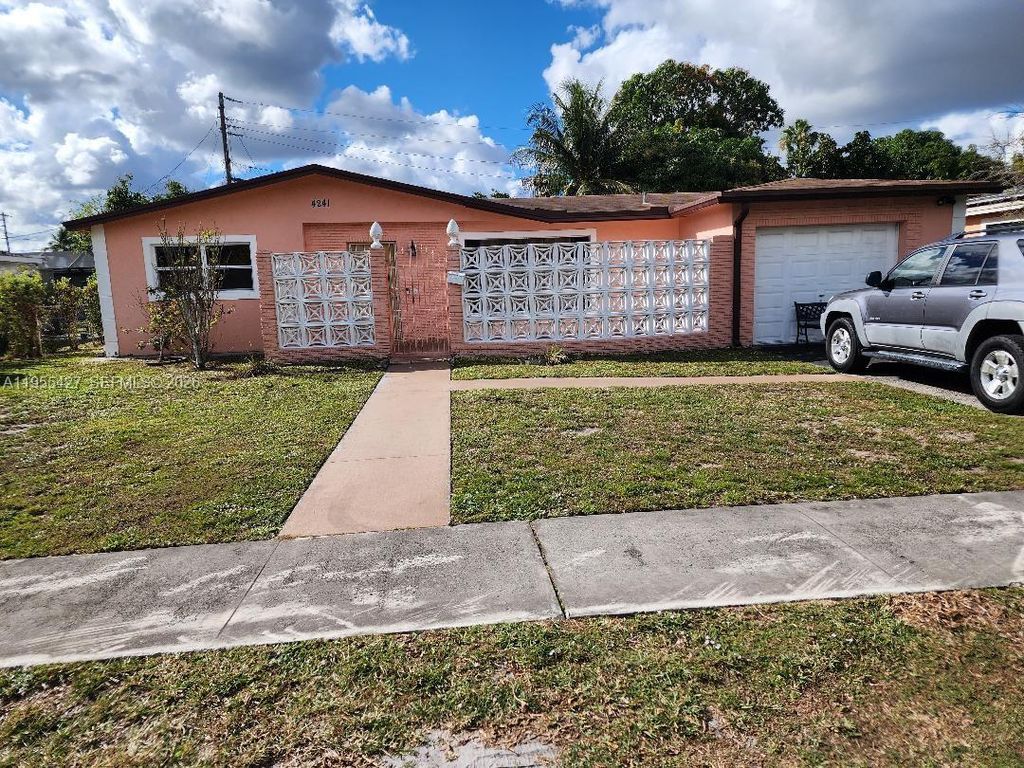 Photo of 4241 NW 36th Ave, Lauderdale Lakes, FL 33309 (MLS # A11955427)