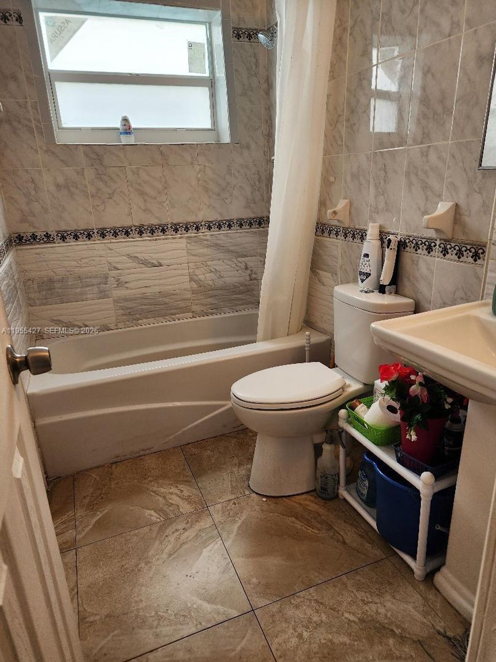 Photo of 4241 NW 36th Ave, Lauderdale Lakes, FL 33309 (MLS # A11955427)