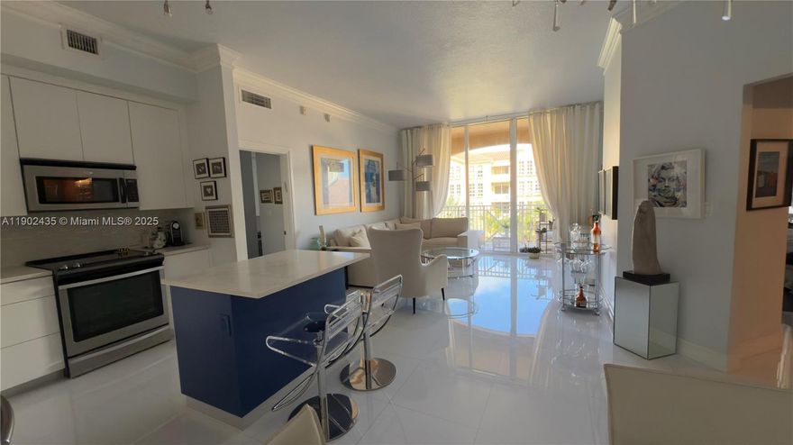 Stunning completely remodeled 2 bed 2 bath residence in the prestigious Alaqua Aventura featuring  premium finishes, open-concept living, and modern kitchen with high end stainless steel appliances. Both designer bathrooms showcase contemporary fixtures and custom tilework, white spacious bedrooms offer ample closet space with primary suite boasting an elegant en-suite. Residents enjoy exceptional amenities including a resort style swimming pool and state of the art fitness center, all conveniently located near Aventura Mall, dining options, house of worship and beaches