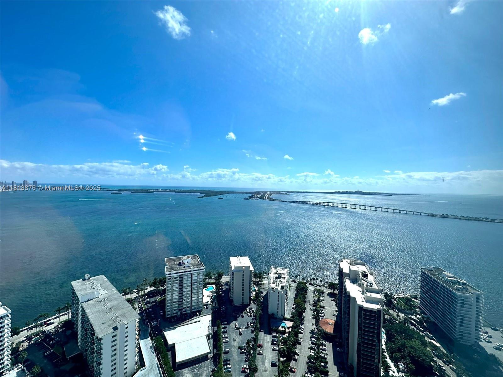 Perched on the 42nd floor of the iconic Four Seasons Residences Miami, Unit 42E offers breathtaking panoramic views of Biscayne Bay and the city skyline. This impeccably maintained residence combines luxury and comfort with high ceilings, floor-to-ceiling windows, and top-of-the-line finishes throughout. Enjoy five-star amenities including full-service concierge, Equinox fitness center, pools, spa, and in-room dining. An unparalleled lifestyle in the heart of Brickell.