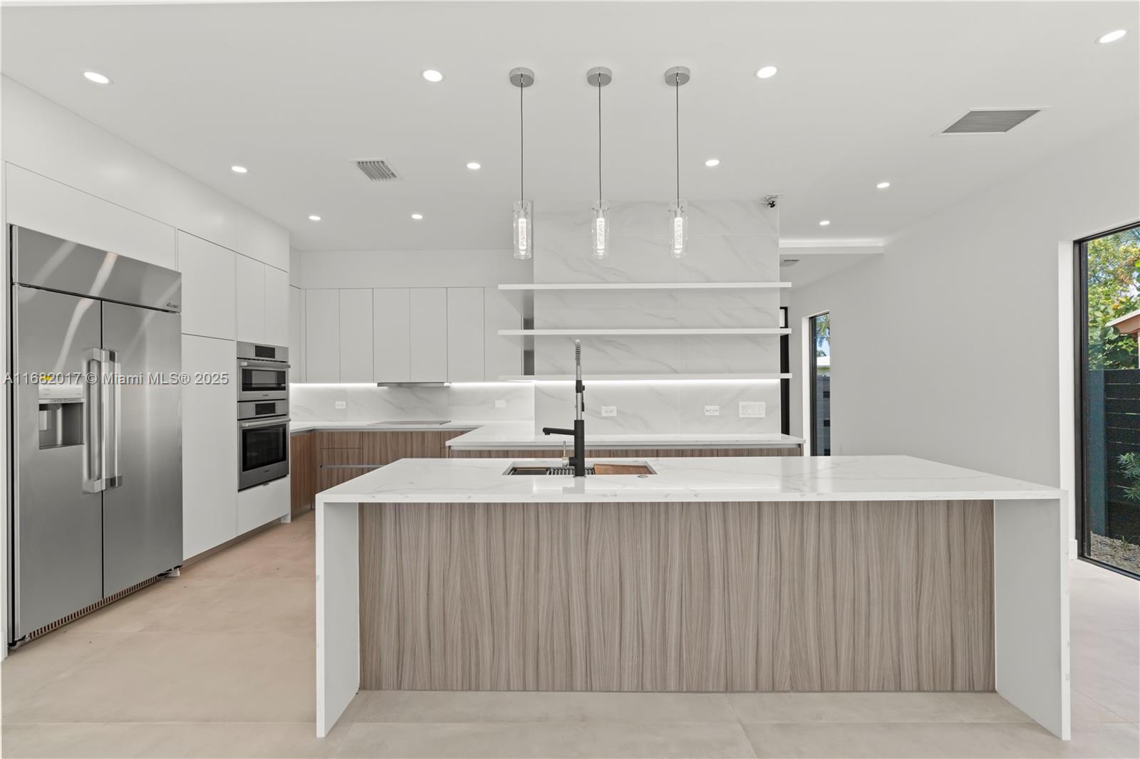 Experience modern living at this elegant residence in the exclusive community of Coral Ridge, in the heart of Fort Lauderdale. This home, offering three spacious bedrooms and four bathrooms; with high ceilings throughout that enhance the sense of space and luxury.
The open concept living area flows seamlessly into the terrace, thanks to multitrack sliding doors that create an extended indoor-outdoor space. Inside, you'll find porcelain flooring throughout and quartz countertops. The kitchen features state-of-the-art appliances, ideal for culinary enthusiasts. Designed with entertaining in mind, the home has an oversized rooftop terrace equipped with a summer kitchen and provisions for a jacuzzi installation. Rooftop is perfect with both sunrise and sunset views.