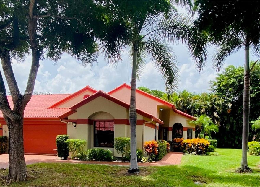 Beautiful Remodeled, Largest Carnation 2 Model in a Charming, Quiet, Gated, Secure Community, 2 Car Garage, Volume Ceilings, Garden View, Partial Lake View, Best Location! HOA Includes Everything: Gate, Security. Alarm, Cable, Internet, Water, Roof, Exterior Painting, Trash, Sewer, Insurance, Amenities, Landscaping. It's Close to the Beach, Entertainment, Grocery Stores, Shopping, Hospitals, Turnpike, 95! Featuring a Beautiful Updated Kitchen, White Quarts Countertops, Stainless-Steel Sink! Freshly Painted, Tile Floors Throughout, Remodeled Bathrooms w/Marble & Granite Countertops, New LED Light Fixtures & Window Treatments, Laundry Room, Oversized Glassed-in Lanai! World Class Amenities! Gorgeous Remodeled Clubhouse, Heated Pool, Jacuzzi, Tennis/Pickle Ball Courts, Exercise & Card Rooms!