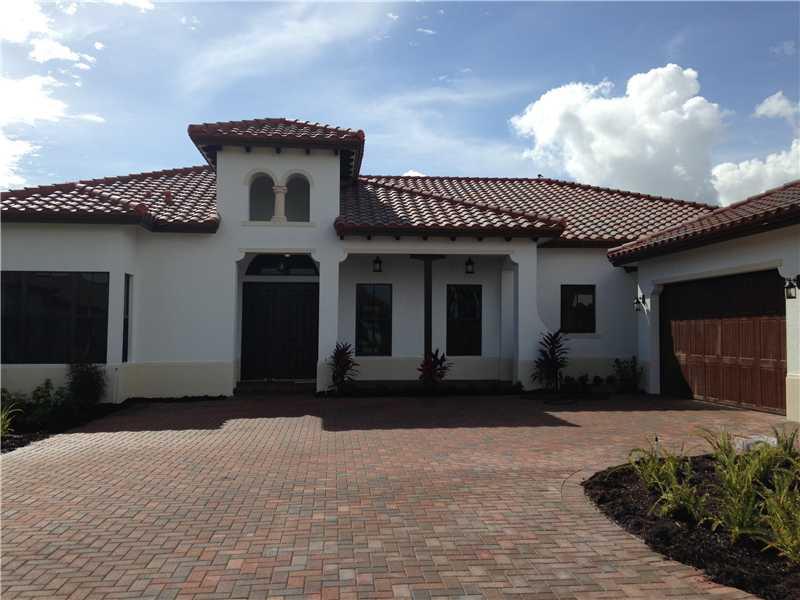 Compleated new construction, never lived in.Lots of upgrades, impact windows, High end granite counter top in Kitchen, Modern under mount sinks in bathrooms. 3886 AC SF. 4,951 Total SF. 4 bds + den/5th bed 3.5 baths, 12 ft ceilings Living room, dining ro om, family room, breakfast bar, breakfast nook, den, master bedroom with sitting room and Jacuzzi tub, his and hers walk-in closets, 3 car garage, builders acre. Very private pie shaped lot on a small canal. Lots of room for a pool,