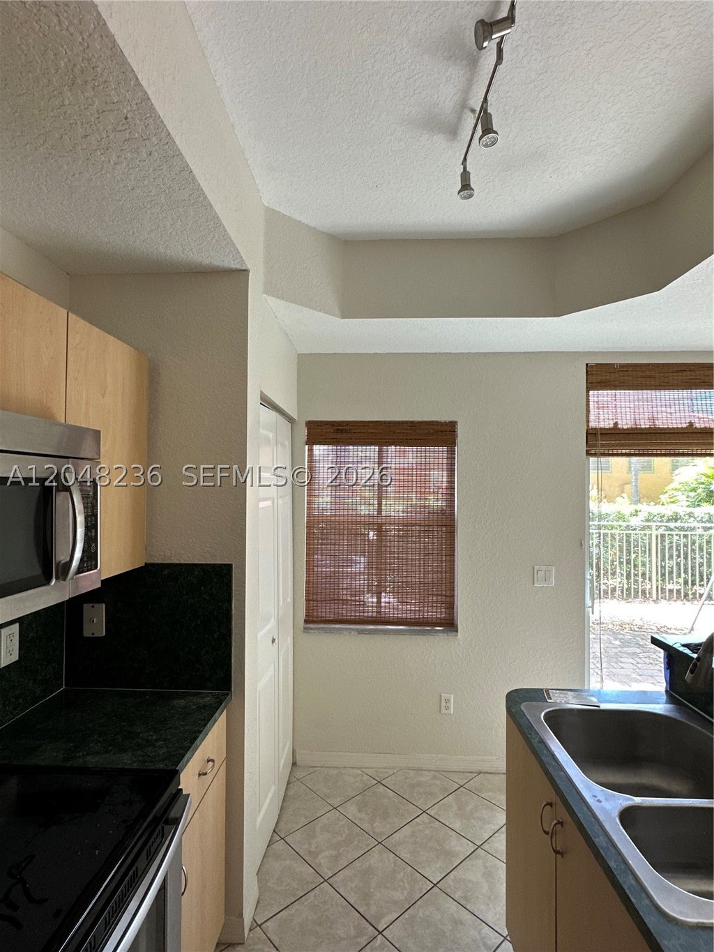Photo of 4952 Tradewinds Ter #506, Dania Beach, FL 33312 (MLS # A12048236)
