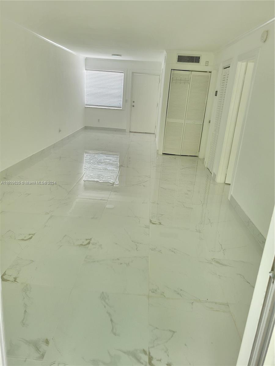 Great condo steps to Lincoln Road. Newly upgraded. One bedroom 1 & 1/2 Bathroom with balcony.
Assigned garage parking space. Brand new porcelain floors and new bathroom. Secured building with pool and community laundry.