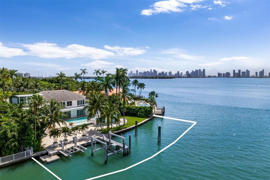 Experience sheer luxury at this magnificent estate situated on serene Sunset Island II. Enter through private gates, step over a tranquil koi pond as you enter this contemporary 9,984 SF residence boasting 154’ on the wide-open bay. Bask in a meticulously designed pool area and private dock. Open floorplan layout with breathtaking panoramic view, ideal for entertaining with an indoor/outdoor experience. The spacious 2-tiered principal suite features its own private rooftop area, bathroom boasts steam shower, private patio & his and hers walk-in closets. Luxurious features include audio system, 3 jet ski lift, office, chef’s kitchen with top-of-the-line appliances & sauna room, gym overlooking the open bay views. Architectural details seamlessly merge with the stunning vistas throughout.