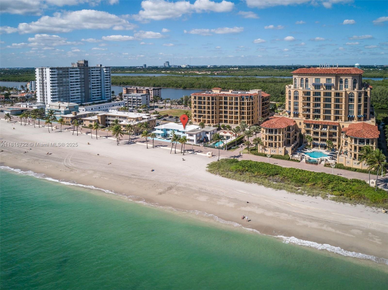 This rarely available 1 bed/ 1 bath furnished corner unit in boutique oceanfront building along the Hollywood Beach Broadwalk, is the perfect getaway. From the second you step through the front door you're mesmerized by the ocean views. Vaulted wood finished ceiling. Wood and tile flooring. Impact glass throughout. Washer/Dryer. Reserved parking spot.