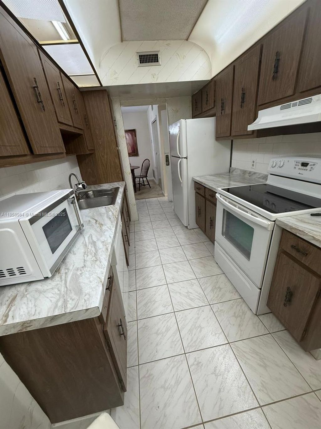 Photo of 4200 Hillcrest Dr #206, Hollywood, FL 33021 (MLS # A11858964)