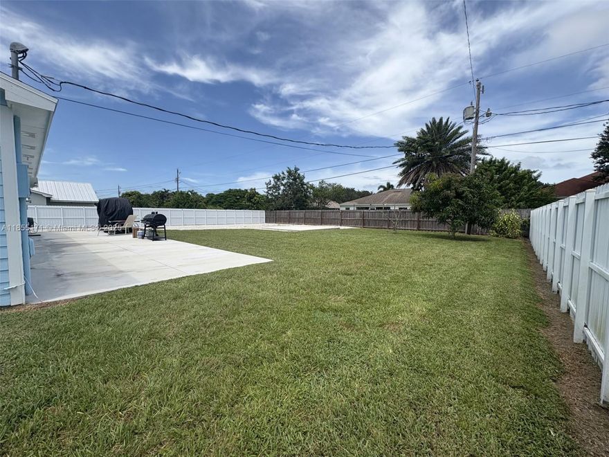 Welcome to 2273 SW Mount Vernon Street, a charming single-family residence situated on an oversized 12,125 sq ft lot in the desirable city of Port St. Lucie! Nestled on a quiet, tree-lined street with no HOA, this property offers space, privacy, and flexibility rarely found at this price point. A concrete slab has been poured in the front, making parking effortless and accommodating for multiple vehicles. The home is located in a well-established neighborhood with convenient access to parks, schools, shopping, dining, and major highways. Whether you're looking for a primary residence or a solid investment, this property is a standout opportunity in a growing market!