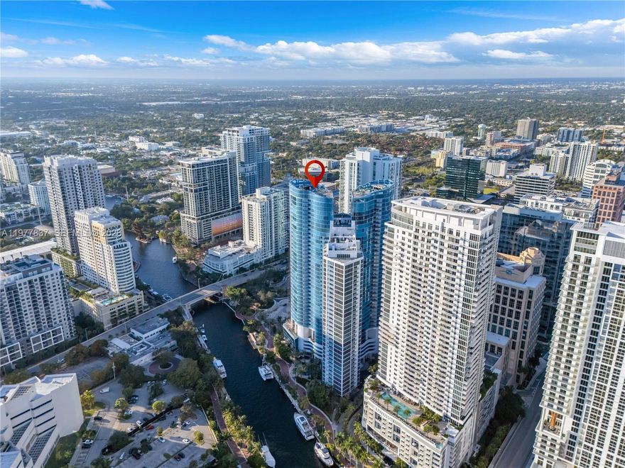 STRATEGICALLY PRICED FOR TODAY'S MARKET— OVER $200K IN UPGRADES—
Turn-key luxury in the heart of the Venice of America. This 2-bed + entertainment ‘s bar, 3-bath residence at Las Olas River House offers over 2,100 sq ft of refined living with floor-to-ceiling glass showcasing sweeping views of the downtown skyline and situated along the New River . A secure fob-access elevator opens to a private foyer leading to a light-filled layout with designer lighting, premium flooring, a gourmet kitchen, an entertainer’s bar area and a completely renovated stunning master bathroom. Residents enjoy a resort-style lifestyle with a heated pool, cabanas, sauna, and a state-of-the-art fitness center overlooking the river. Huizenga Park is just downstairs with a dedicated dog run, perfect for pet lovers. Step outside to the Riverwalk and catch the Water Taxi to enjoy fine restaurants, cafés, and the Broward Center theater without ever needing a car. Concierge, valet, and LauderGO! shuttle service complete this exceptional riverfront living experience.