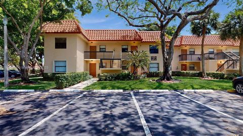 Photo of 15805 W Waterside Cir #202, Sunrise, FL 33326 (MLS # A11805024)