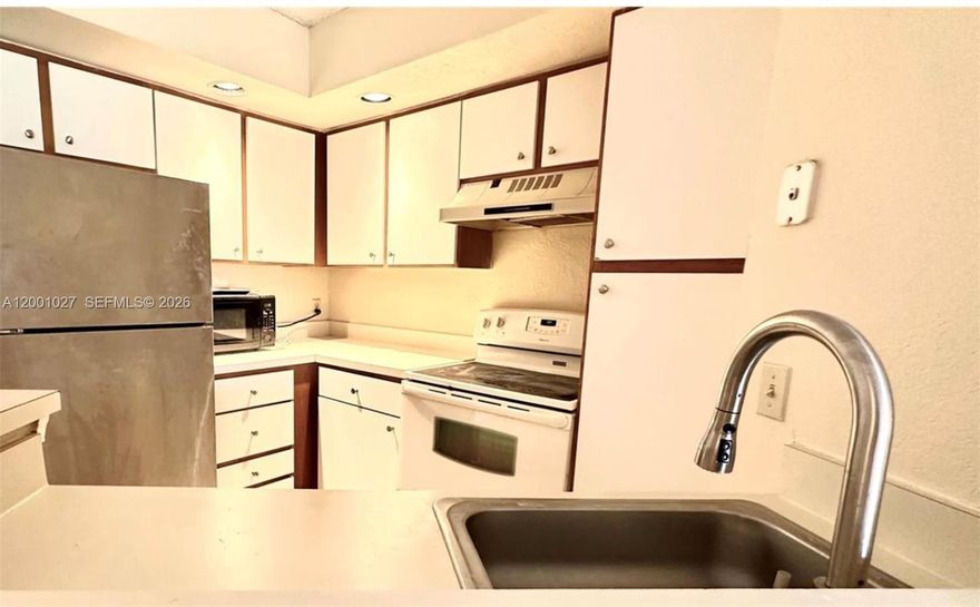 Welcome to this well-maintained condo in a convenient Margate location! This unit offers a comfortable and functional layout with bright living and dining areas that create a warm, inviting atmosphere. The kitchen provides ample cabinet space and is designed for everyday ease. The primary bedroom is generously sized with good closet storage,.

Located on an upper floor, the unit provides added privacy and a pleasant setting to enjoy your living space. The community is professionally managed and includes an HOA.
Conveniently situated near major roadways, shopping, dining, and everyday essentials. Assigned and guest parking may be available per association guidelines.

Great opportunity for a primary residence or investment in a well-located Margate community.