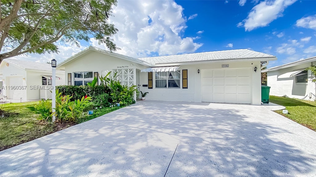 Photo of 7105 NW 73rd Ave, Tamarac, FL 33321 (MLS # A11960367)