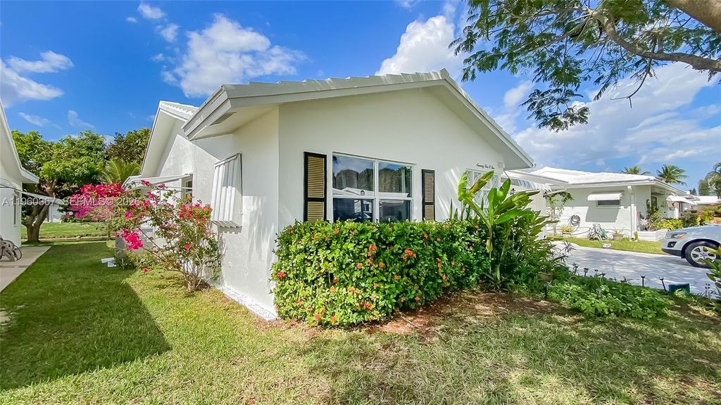 Photo of 7105 NW 73rd Ave, Tamarac, FL 33321 (MLS # A11960367)