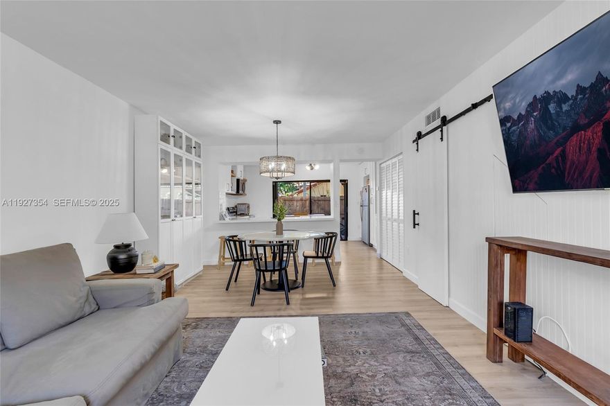 Welcome to this hidden gem in the sought-after Dadeland Cove community! This beautifully maintained townhouse offers modern living with warm and homey finishes. The home features a bright living and dining space that extends to the open kitchen space with plenty of cabinetry, kitchen island and coffee bar. Upstairs, you'll find two generously sized bedrooms, each with its own en-suite bathroom for added privacy and comfort. Relax or entertain on the private fenced patio, ideal for outdoor dining. Dadeland Cove is a gated community offering 24-hour security, a sparkling community pool, and well-maintained common areas. Located just minutes from Dadeland Mall, top-rated schools, restaurants, Whole Foods, Continental Park, US and quick on ramp onto 826.