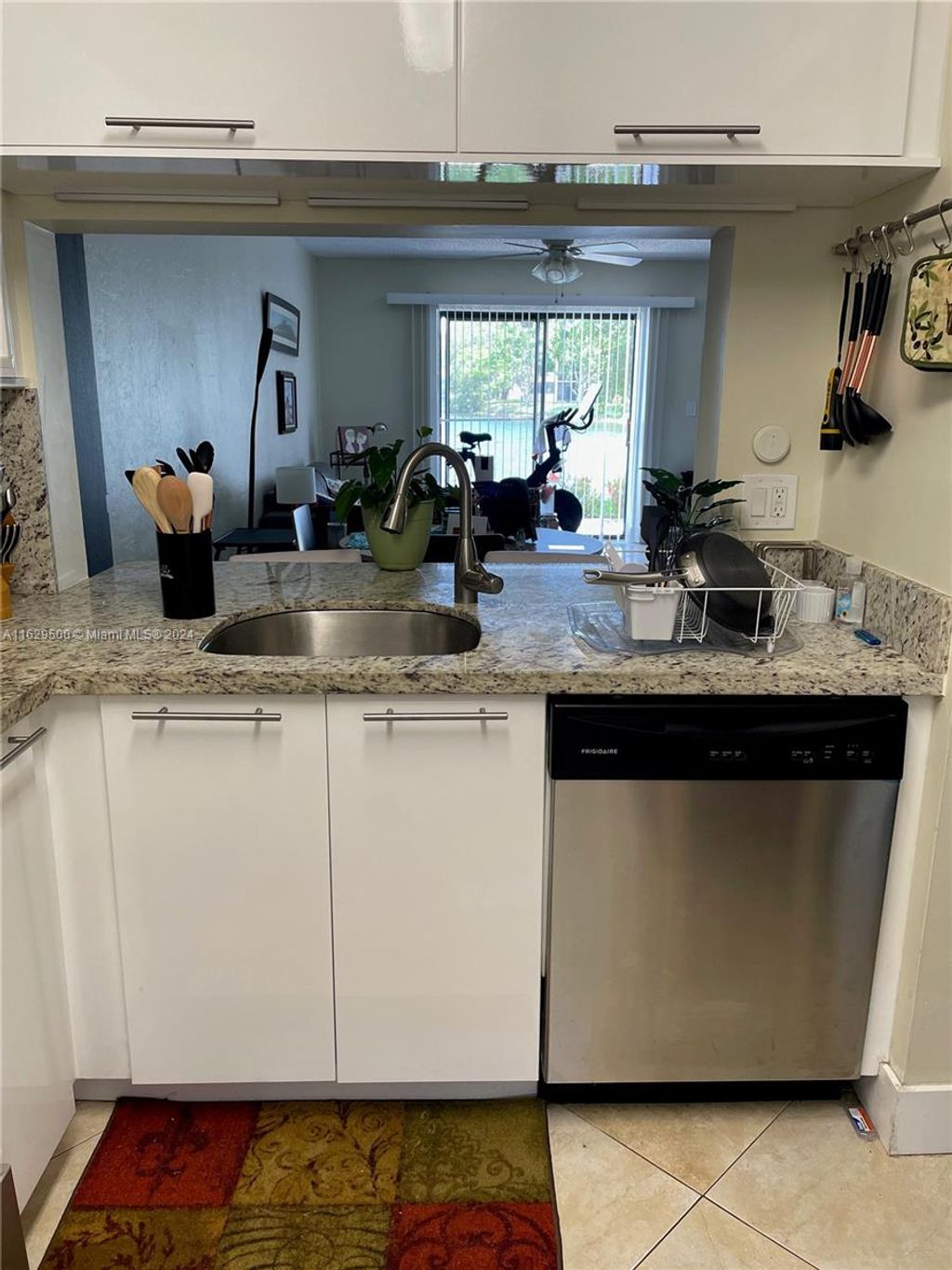 Photo of 10003 Winding Lake Rd #102, Sunrise, FL 33351 (MLS # A11629500)