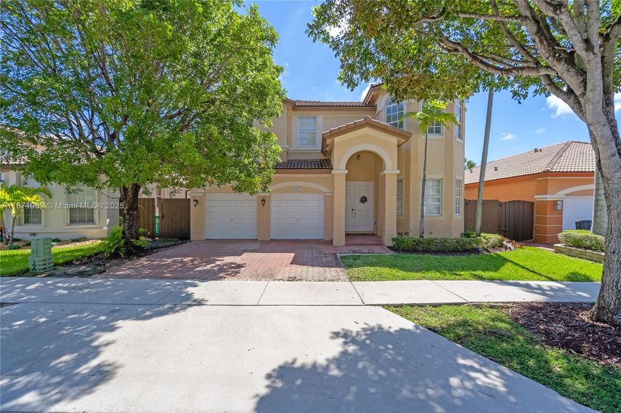 Welcome Home! This stunning 5bed/4.5bath residence in the Galapagos subdivision of Islands at Doral offers 3,650 sqft. of living space filled with natural light, soaring ceilings & a thoughtfully designed layout. The first floor includes a bedroom with en suite bath, perfect for multi-generational living. The chef’s kitchen boasts stainless steel appliances, ample cabinetry, and opens to a backyard ideal for entertaining. The expansive master suite features walk-in closets and a spa-like bath with dual sinks, separate shower & soaking tub. Substantially renovated with newer A/C units & solar panels for energy efficiency. Walking distance to the clubhouse with resort-style amenities: pool, spa, gym, business center, tennis & more . Located near major highways, MIA, FIU & Dolphin Mall.