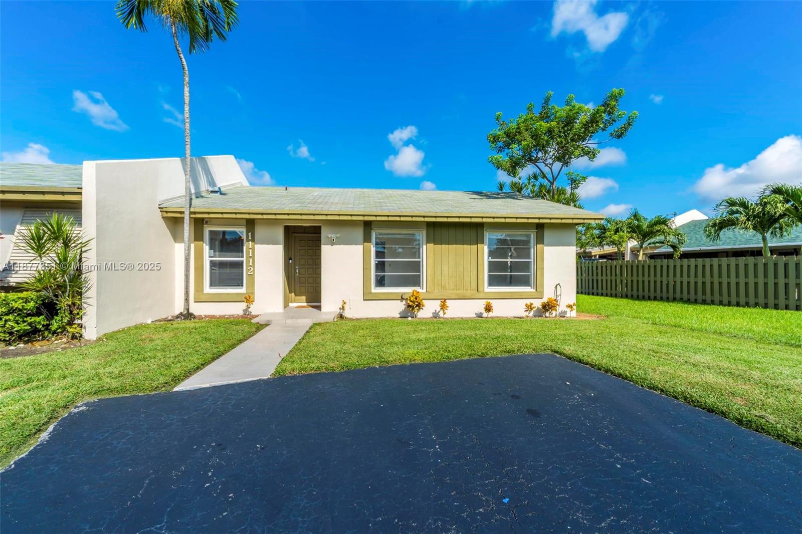 Beautifully updated 3BR/2BA corner townhouse in Devon-Aire Community #1! Features a brand-new kitchen with dishwasher, wine cooler & plenty of cabinets, plus fully renovated bathrooms and a new washer/dryer. ADT wired alarm system will be left at property for new owners. Enjoy a private driveway for 3 cars, large back patio with shed, and low HOA fees. Centrally located near Kendall’s best shopping including Costco, HomeGoods & Ross, with quick access to the Florida Turnpike. Move-in ready and a rare find!