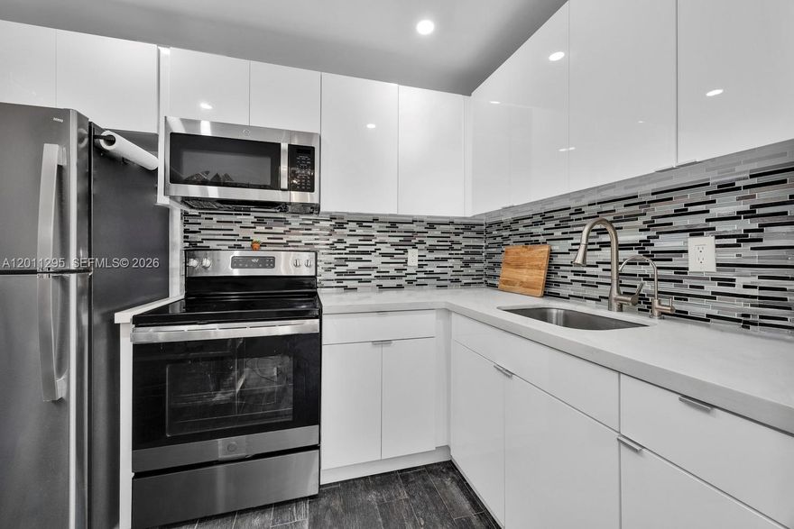 Fully remodeled top-floor corner unit just west of Brickell and Downtown Miami. The thoughtfully updated interior features quartz countertops, stainless steel appliances, and tile flooring throughout. Spacious bedrooms and a refreshed bathroom round out the living space, while a new balcony railing and front door add a fresh feel from the moment you arrive. The building features a brand-new roof and on-site laundry. One assigned parking spot and a gated entrance included. An ideal opportunity for an investor or end user looking for a turnkey condo in a prime location.