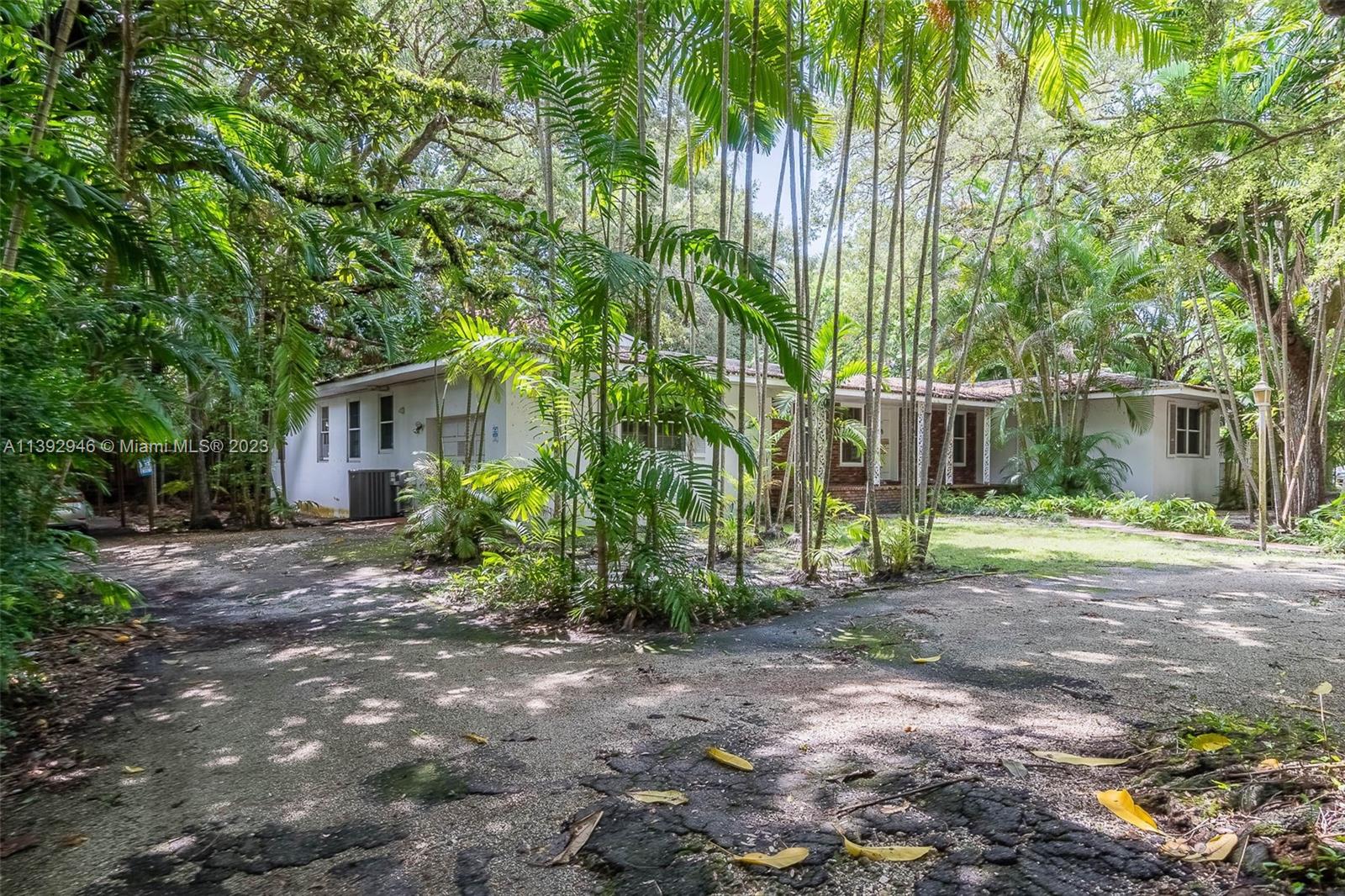 15,000 square feet of land with an elevation of 17 feet in South Grove to build or develop your dream home or project on. The property perimeter does contain a few mature Oaks mixed in with a few trees - invasive in nature – that can be removed without city approval. There is room for the Oaks to be trimmed back and manicured for that special canopy that will accentuate the new construction once complete. This corner lot is rectangular in shape and conducive to a “left to right” build. The current structure is a 3/2 pool home at 2343 square feet built back in 1950. A new survey as June 6th has been completed. All offers welcomed!!
