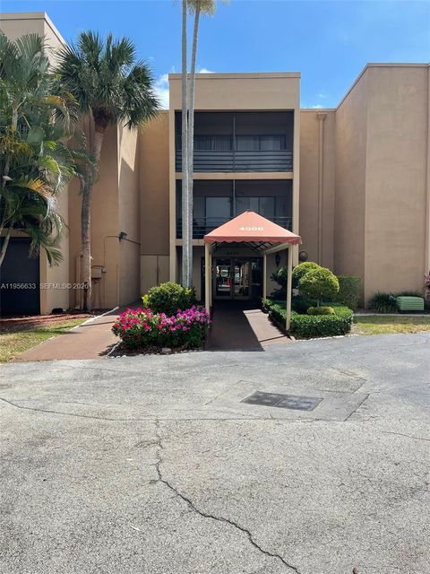Photo of 4000 N Hills Dr #32, Hollywood, FL 33021 (MLS # A11956633)