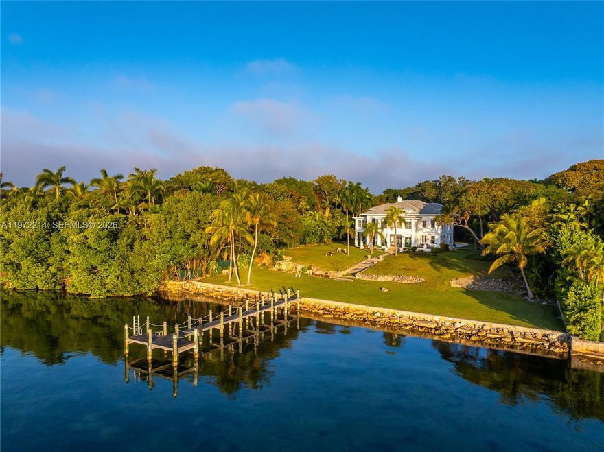 With 170+ feet directly on Biscayne Bay and spanning 1.61 acres, this one-of-a-kind waterfront estate sits on iconic Brickell Avenue in Coconut Grove, FL. Offering 5,705 SF of living area with 7 bedrooms and 5 baths, the 3-story residence is extraordinary — yet it is the land, location, and setting that make it truly irreplaceable. Set along the famed “Millionaire’s Row” on Brickell Ave and positioned high on the oolite limestone ridge of Silver Bluff, the property enjoys unobstructed bay views and remarkable privacy. Just minutes from the heart of the Grove’s bustling restaurant and shopping scene, next to the Vizcaya Museum & Gardens, this secluded location offers easy access to Downtown Miami and the Brickell corridor, Key Biscayne, Miami International Airport and Miami Beach. Enjoy watersports and marine life from the extended private dock. A rare opportunity to own a defining piece of Miami — an oasis unlike any other.