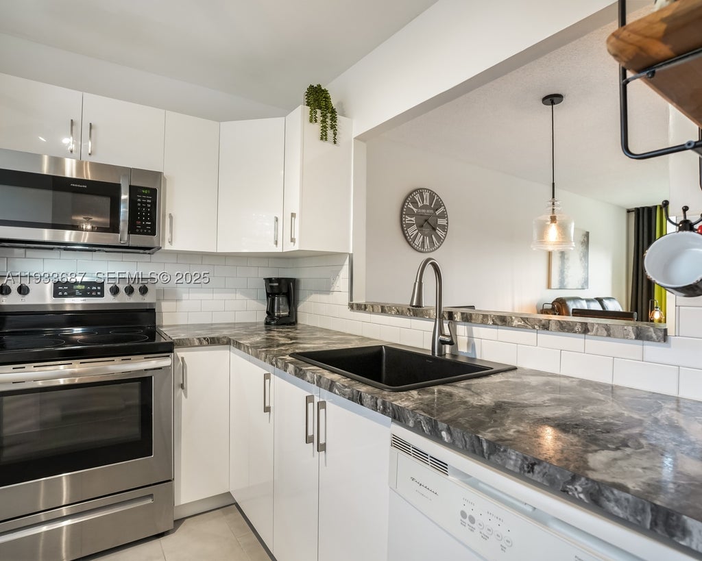 Photo of 4706 NW 36th St #507, Lauderdale Lakes, FL 33319 (MLS # A11933687)