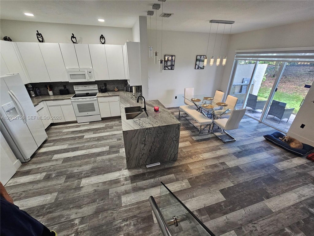 Photo of 4331 SW 124th Way, Miramar, FL 33027 (MLS # A12032756)