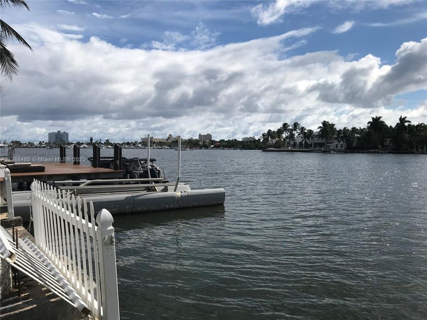 Unveiling an extraordinary waterfront residence in Hollywood Lakes. This 5BR/4.5BA spans over approx. 4,000 sq ft on an 11,700 sq ft lot. Two primary bedrooms, each with an ensuite, offering a dedicated maid's quarters adds convenience. Vaulted ceilings and a harmonious blend of marble and wood flooring create a spacious and interior. The kitchen seamlessly connects to living and dining spaces. Step outdoors featuring a pool and direct access to the Intracoastal Waterway. Nestled in Hollywood Lakes, providing quick access to beaches, dining, and entertainment. Don't miss the chance to own this exclusive waterfront property.