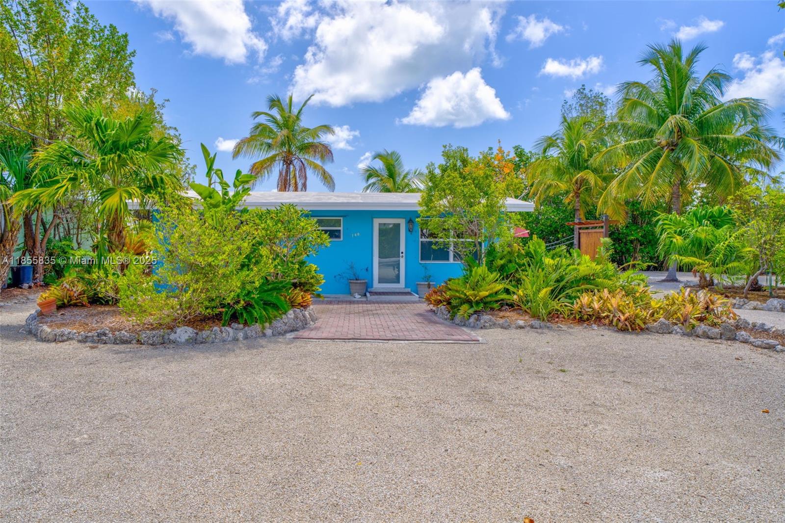 **DOUBLE LOT!** FUNKY KEYS PRIVATE WATERFRONT HIDEOUT -enjoy/rebuild on GIANT 12,500 sqft lot with impressive 100' frontage on DEEP WATER canal in desirable PLANTATION KEY COLONY. Highly rated schools Plantation Key(K-8) and Coral Shores(9-12) nearby.This inviting home offers a blend of character, comfort, and potential. Solid CONCRETE STRUCTURE, impact-resistant windows/doors for security/serenity. This 2BR retreat is ideally located in the heart of Islamorada. Highly rated schools nearby. Voluntary HOA has private bay front homeowner's park, beach, truck/trailer parking, boat ramp! EASY ACCESS TO BAY AND OCEAN. Enjoy the home as is, remodel, or you can build your dream home on the vacant lot next door that is included...! Inquire about house on lot and vacant lot for sale separately!