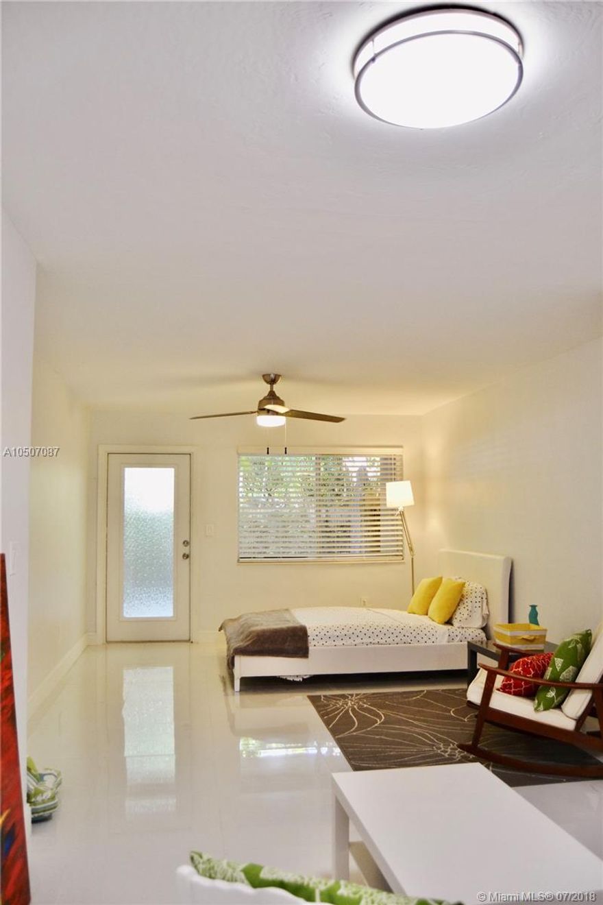 Incredible studio unit has been totally renovated to create a charming, quiet space in a good South Beach location. There are new impact windows, white tile floors, a new kitchen with granite counters, stainless appliances, gas cooking and good storage. The bathroom has new tiles vanity and sink.  The living area has a modern split A/C system and good storage.  There is a large patio at the front entry.  Parking on site. Laundry on premises.  close to shopping, transportation and the Beach. Easy to show with an appointment.