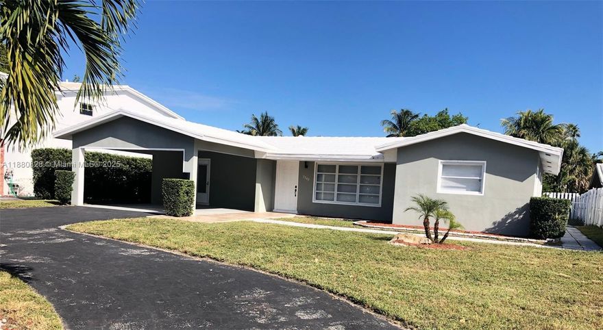 Beautifully remodeled 3 bed, 2 bath home featuring an open floor plan with porcelain tile throughout and stainless steel appliances. Enjoy water views from your living room and back patio. Fully fenced yard, located on a canal, in a prime spot just minutes from shops, dining, movie theater, Wilton Manors, and only about 10 minutes to Downtown Fort Lauderdale, Las Olas, and the beaches. Fast approval—small pets welcome!