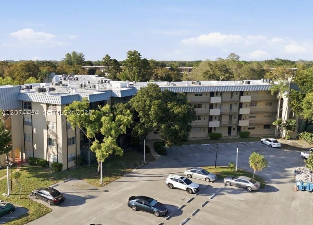 Photo of 6101 N Falls Cir Dr #405, Lauderhill, FL 33319 (MLS # A12074494)