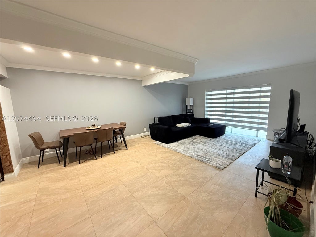 Photo of 6101 N Falls Cir Dr #405, Lauderhill, FL 33319 (MLS # A12074494)