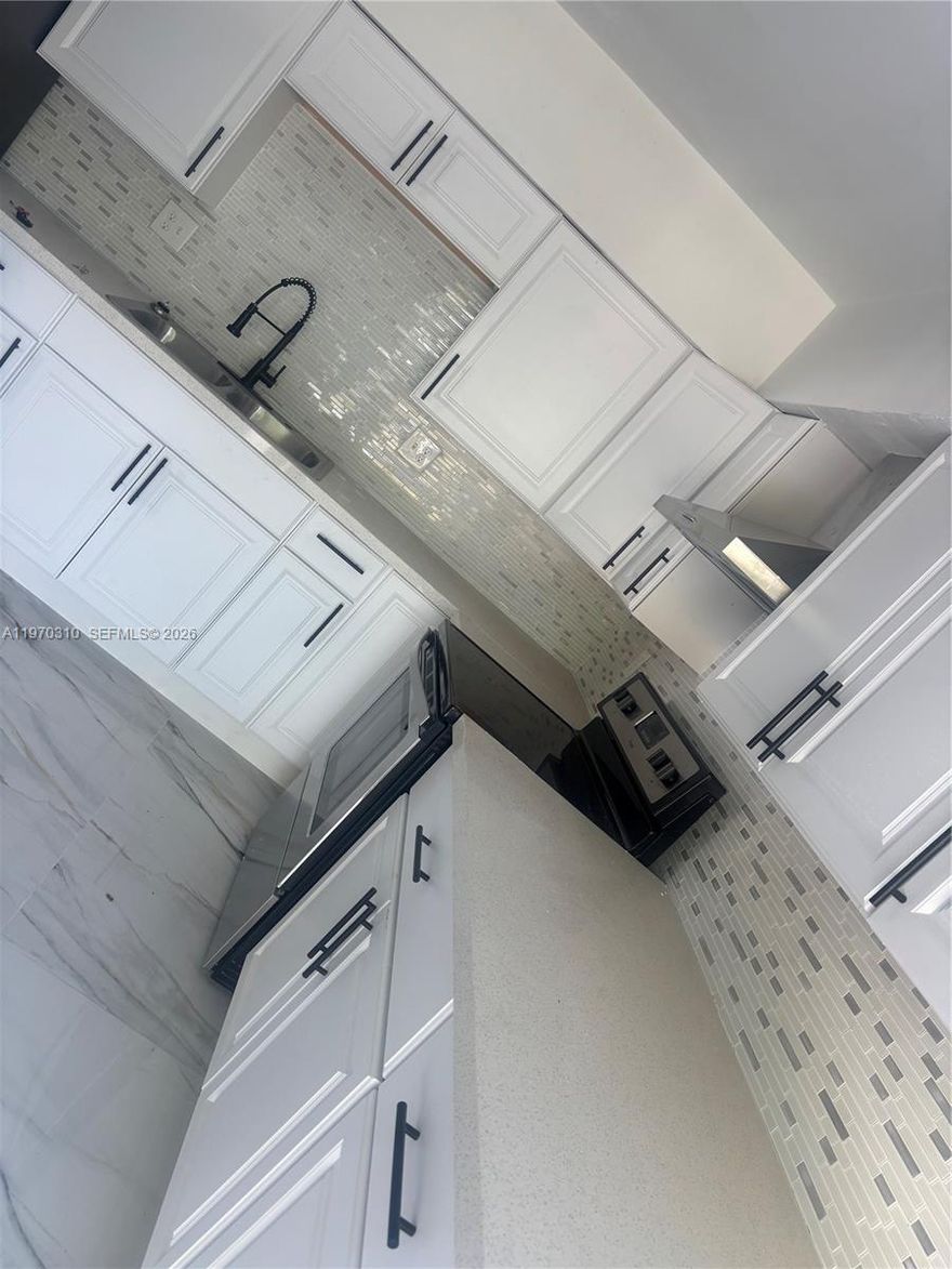 Remodeled Home!!! Canal view !!!!! New Floor, New kitchen, New Bathrooms