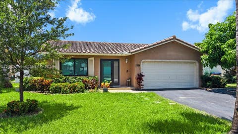 Photo of 2338 NW 98th Way, Coral Springs, FL 33065 (MLS # A12053805)