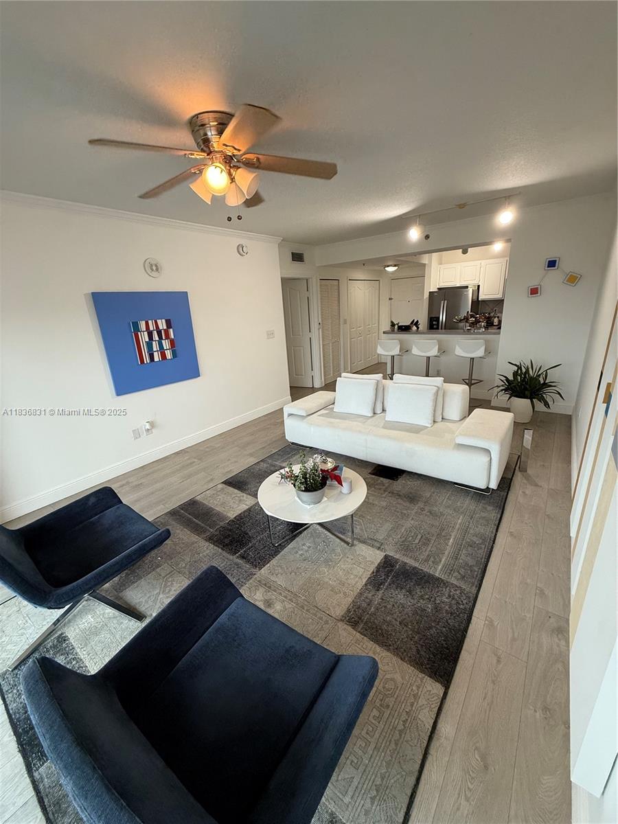 This stunning 1/1-bathroom offers breathtaking panoramic views of the city and is located just a short walk from Coral Gables and Miracle Mile. Inside, you'll find a walk-in closet, a large bedroom and bathroom, and a well-equipped kitchen featuring a generous pantry and in-unit washer and dryer. The apartment also includes a covered parking space. The regal, meticulously maintained building offers amenities including a resort-style pool with sun chairs and outdoor showers, a gym with a sauna, and a community room for gatherings. Enjoy 24-hour security, concierge service, a secure lobby, and controlled access to elevators and entry points. Whether you're seeking elegance, security, or walkable access to the best of the city, this apartment offers it all.
