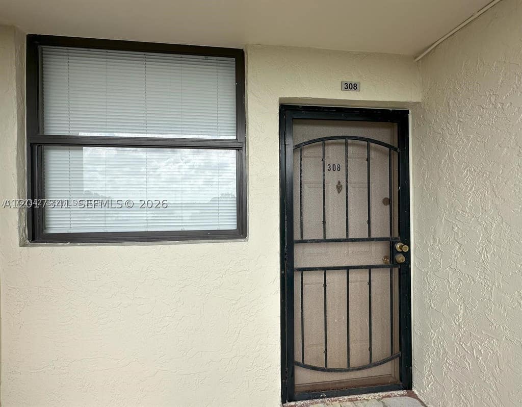 Photo of 117 Lake Emerald Dr #308, Oakland Park, FL 33309 (MLS # A12017341)