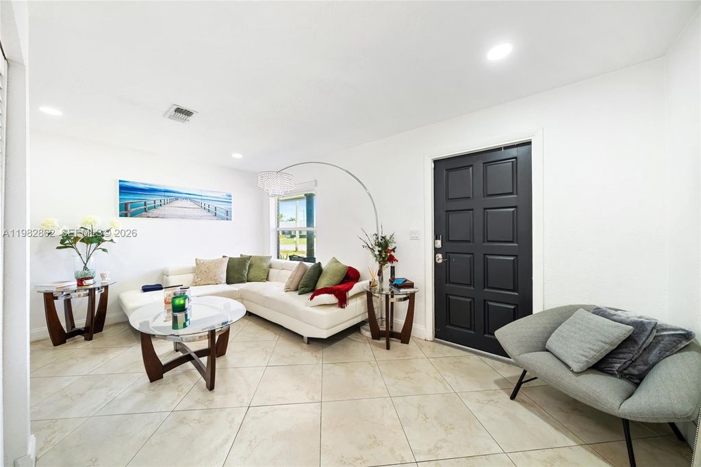 Photo of 1040 SW 66th Ave, Pembroke Pines, FL 33023 (MLS # A11982862)