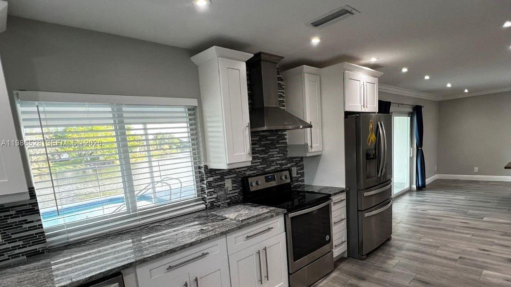 Photo of 12002 NW 29th St, Coral Springs, FL 33065 (MLS # A11986528)