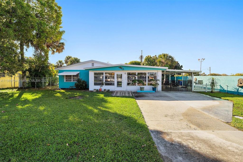 Photo of 1624 NE Orion St, Jensen Beach, FL 34957 (MLS # A11369734)