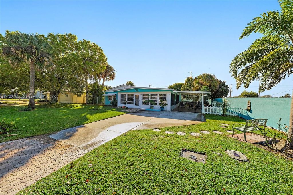 Photo of 1624 NE Orion St, Jensen Beach, FL 34957 (MLS # A11369734)