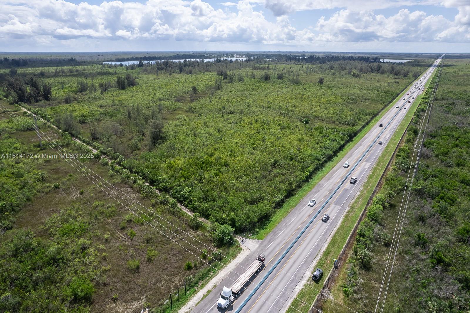 Great investment opportunity, 6.5 acres on US1 and SW 392 St. SW 392 is the road that connects US! and Old Card Sound Road. Miami Dade County is planning on developing the road.
High-traffic visibility with aquaduct passing Parnell to US1 and electric power directly on SW 392 street.
No current zoning, moist, and in a protected area, but with incredible potential and location.