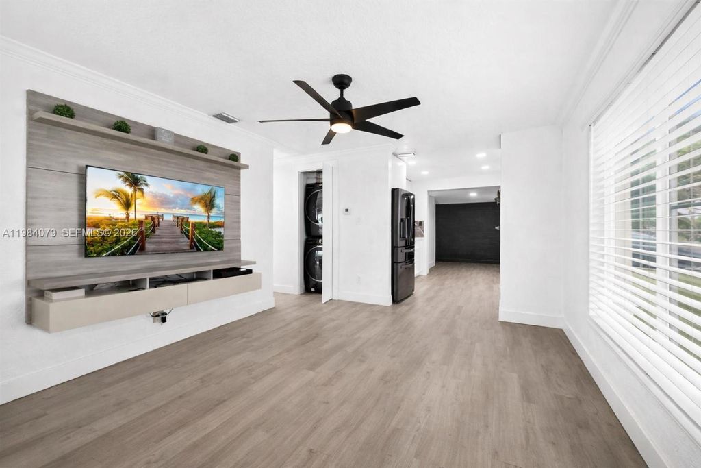 Photo of 5721 SW 38 Ct #5721, Davie, FL 33314 (MLS # A11984079)