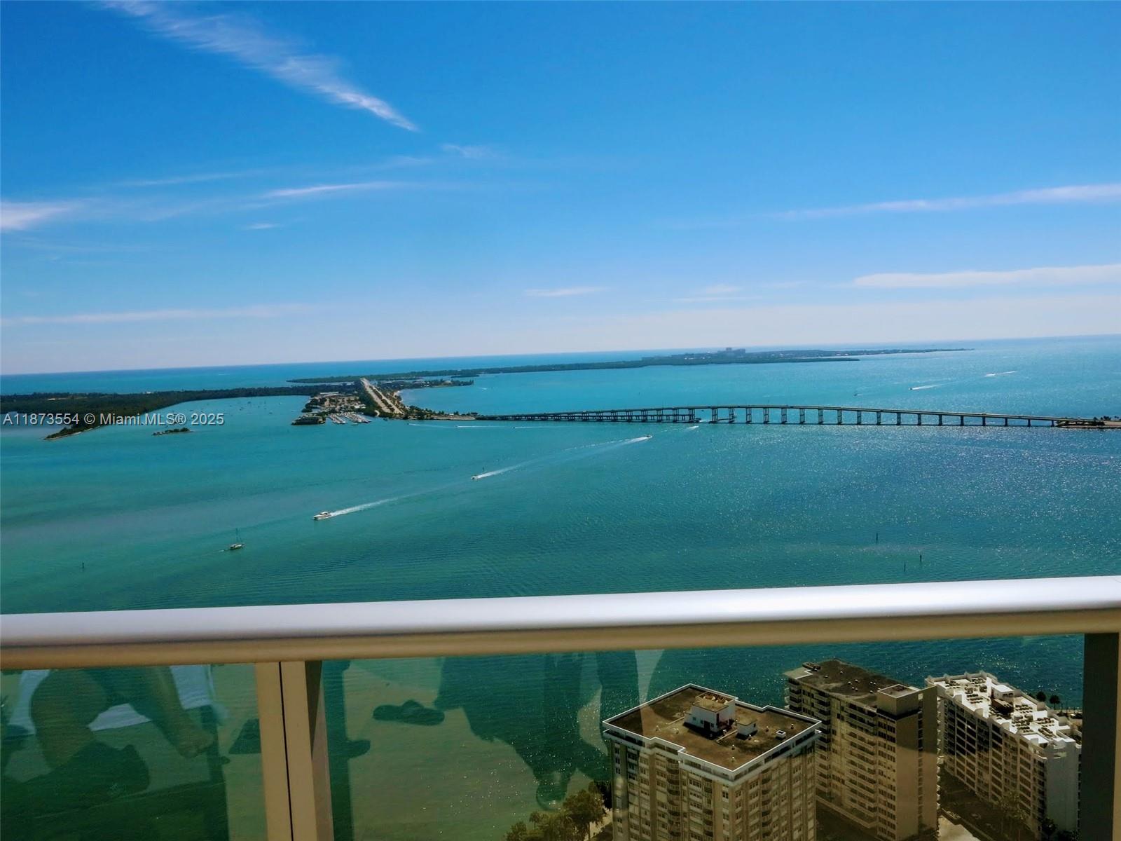 Great 3 Bed / 2.5 Bath corner unit with white marble floors. Amazing unobstructed bay views! Amenities include 24h front desk and valet parking. Resort style building with heated pool at mezzanine, on the 14th floor, 50Ft long lap with poolside cabanas, BBQ area, fitness center, sauna, spa, children playroom and more. Very close to restaurants and metro mover.
