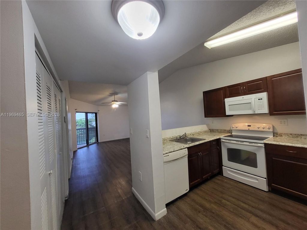 Photo of 9921 Nob Hill Ln #9921, Sunrise, FL 33351 (MLS # A11969465)