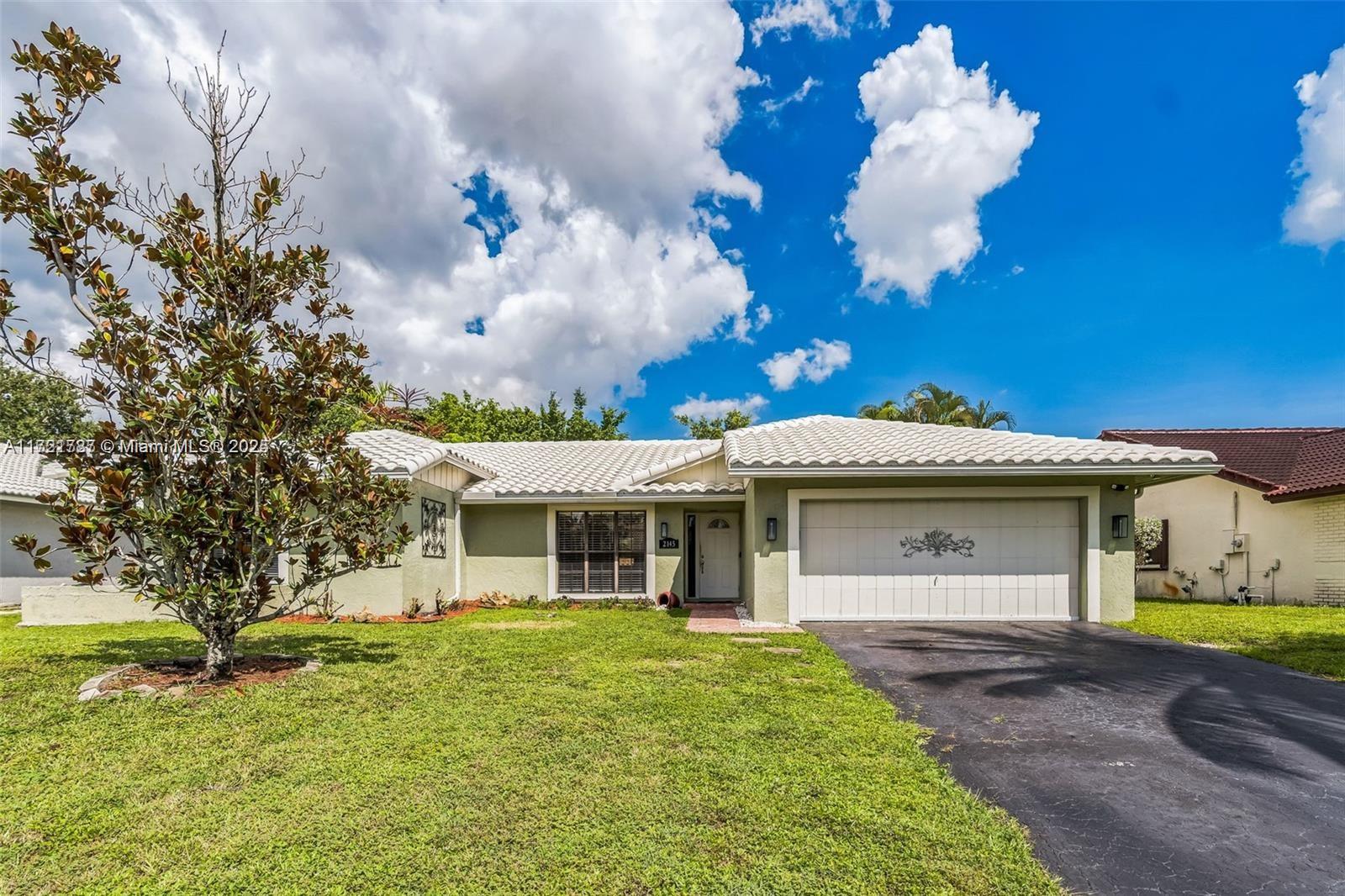 Stunning cul-de-sac home in Coral Springs, a beautifully updated gem nestled in the heart of Coral Springs, FL. This spacious 3-bedroom, 2-bathroom home offers a perfect blend of modern comfort and classic charm. The kitchen is a culinary delight with a white kitchen and tile countertops, new stainless steel appliances 2023, newer roof, new A/C 2023, new tankless water heater 2023, new fence 2024, garage door opening with security system 2023 and fresh paint. Spacious master bedroom, walk-in closet, en-suite bathroom with upgraded vanity and Jacuzzi tubs in both bathrooms. Perfectly situated this home is conveniently close to schools, parks, shopping, and major highways. Enjoy the benefits of the amenities Coral Springs has to offer. Schedule a showing today.